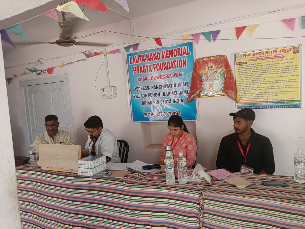 Medicines and records at the health camp desk